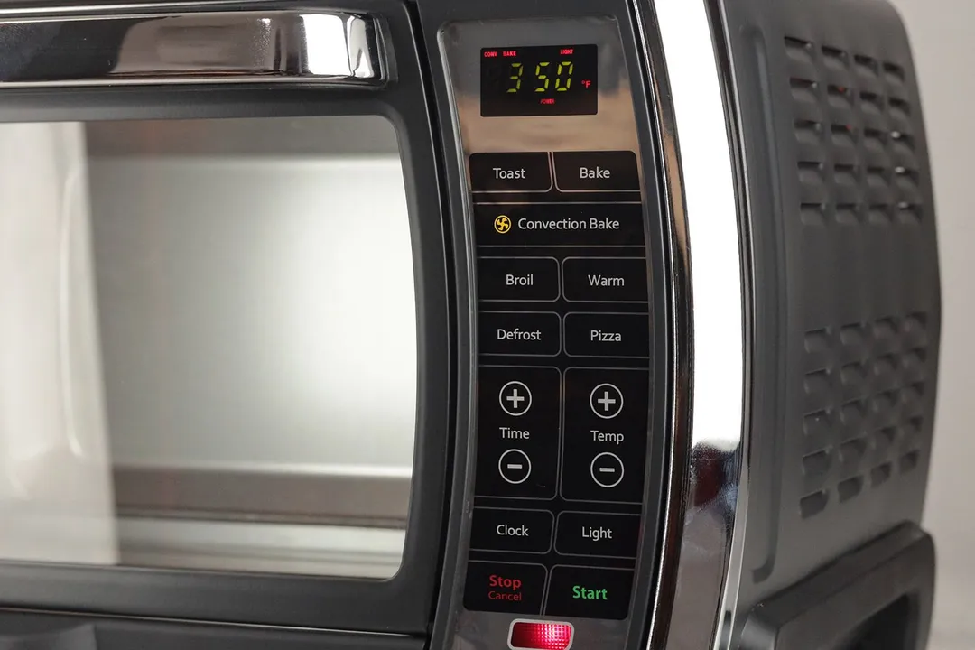 The Oster TSSTTVMNDG-SHP-2 Convection Toaster Oven has an LCD and 15 flat buttons for 7 cooking functions and 8 features.