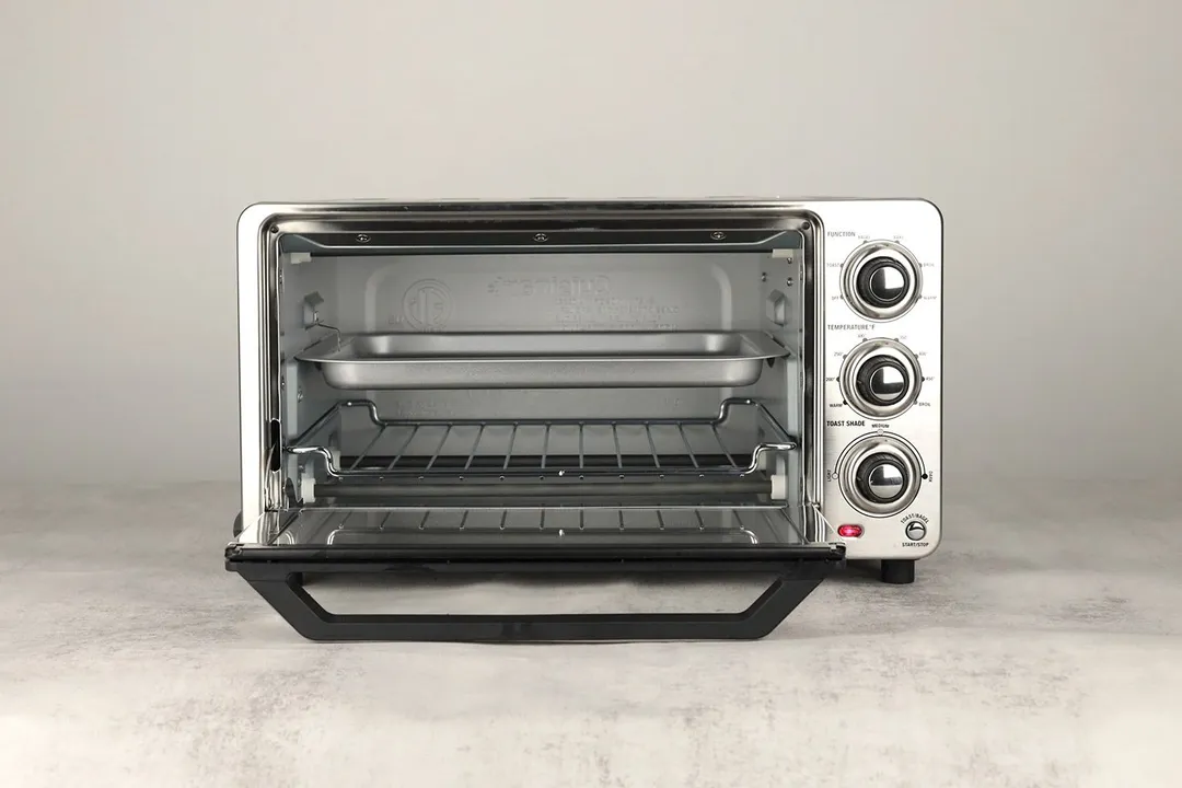 The front of an opened Cuisinart TOB-40N Custom Classic Toaster Oven Broiler with an oven rack and a silver baking pan.