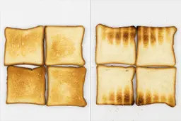 The top and bottom of the best four pieces of toast from the white COMFEE CFO-BB101 Compact Countertop Toaster Oven.