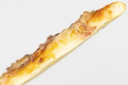 The cross surface of a slice of toast oven baked 9-inch thick-crust meat pizza with cheese, onions, and green bell peppers.