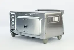 The back and left sides of the Black+Decker TO1760SS 4-Slice Toaster Oven have holes. The back has a power cord and buffer.