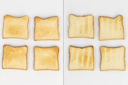 The top and bottom of the best four pieces of toast from the Cosori CO130-AO 30L 12-In-1 Dehydrator Air Fryer Toaster Oven.