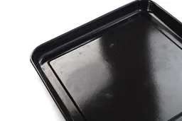 The cleaned enamel baking pan of the stainless steel Breville BOV845BSS Smart Oven Pro Convection Toaster Oven.