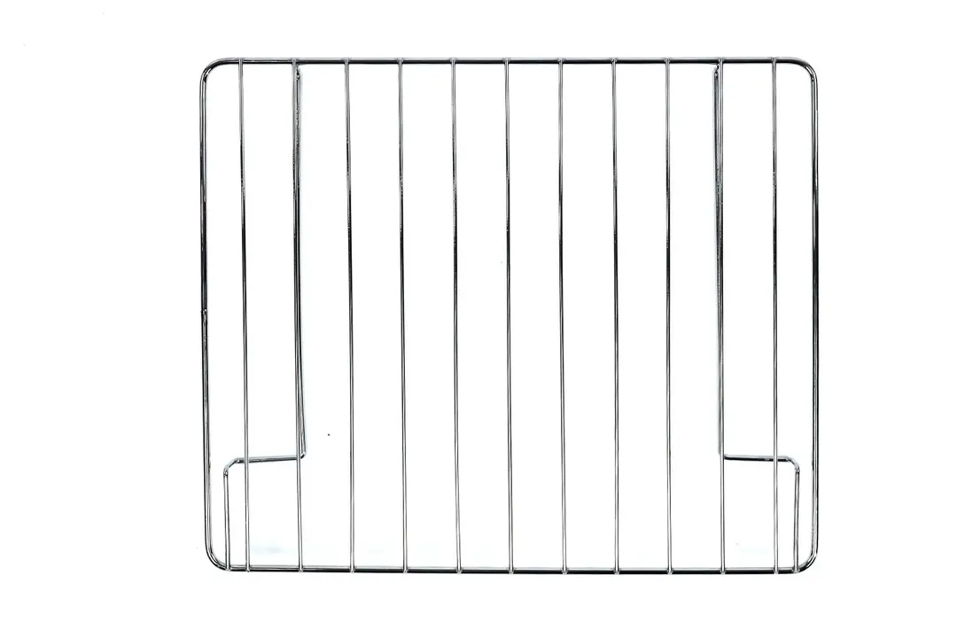 A stainless steel baking rack of the Hamilton Beach 31344DA 4-Slice Easy Reach Roll Top Toaster Oven on a white background.