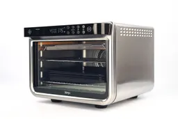 The front of a closed Ninja DT201 Foodi XL Pro Air Toaster Oven has a control panel and the right has air ventilation holes.