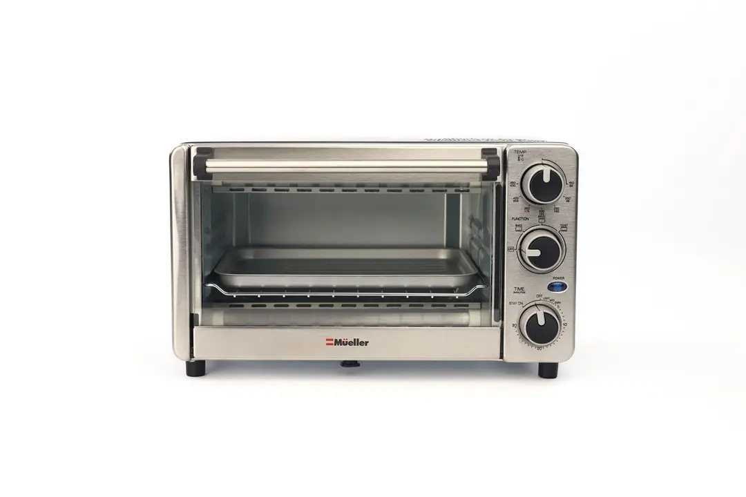 The front of a closed stainless steel Mueller MT-175 4-Slice Countertop Toaster Oven on a white background.