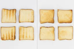 The top and bottom of the best four pieces of toast from the stainless steel Mueller MT-175 4-Slice Countertop Toaster Oven.