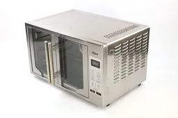 On a white background, the top and the right sides of a closed stainless steel Oster TSSTTVFDDG XL Digital French Door Convection Toaster Oven both have air ventilation holes. The control panel is in the front.