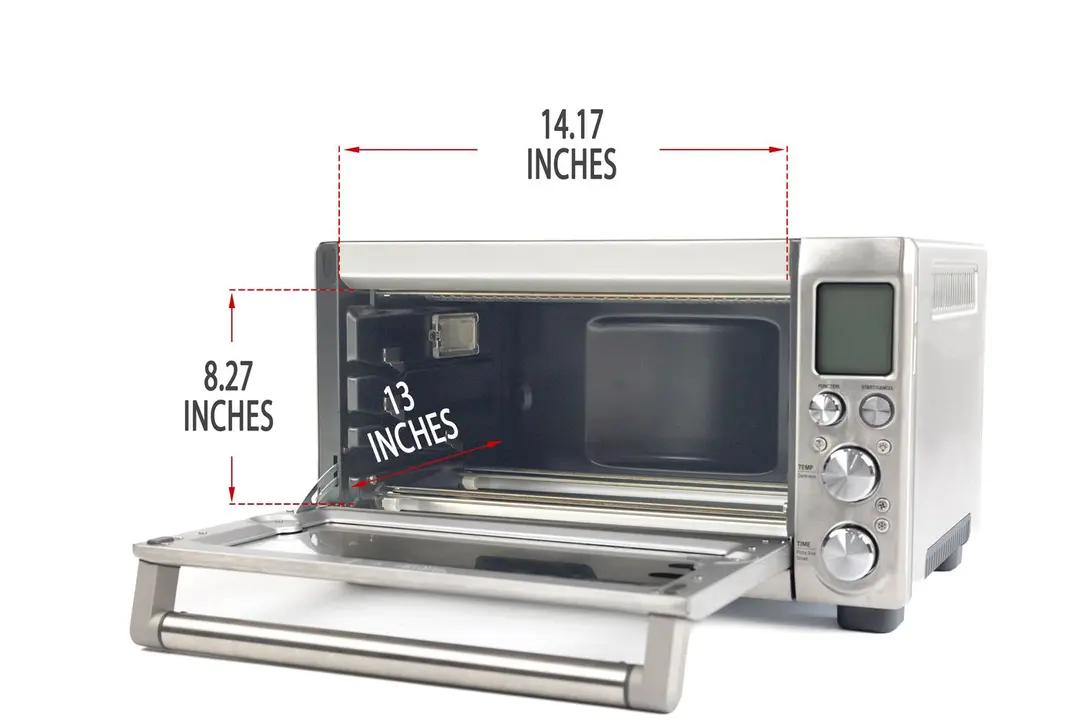 An opened front of the Breville BOV845BSSUSC Smart Oven Pro Toaster Oven with interior measurements on a white background.