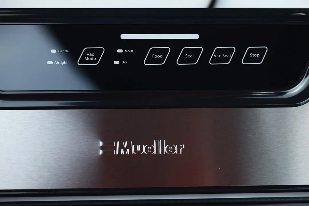 The rows of function buttons on the control panel of the Mueller MV-1100 vacuum sealer.