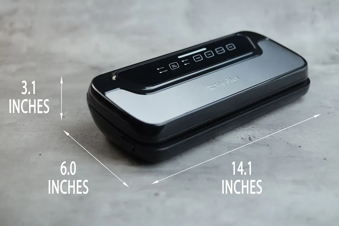 The dimensions of the Mueller MV-1100 vacuum sealer. The length is 14.1 inches, the width is 6.0 inches, and the height is 3.1 inches.