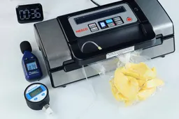 The Nesco VS-12 during a moist food test packaging fresh mango slices. The peak suction strength recorded was 70 kPA in 36 seconds.
