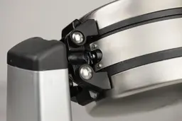 A close-up view of the rotating hinges of the Cuisinart WAF-F20P1 Double waffle maker.