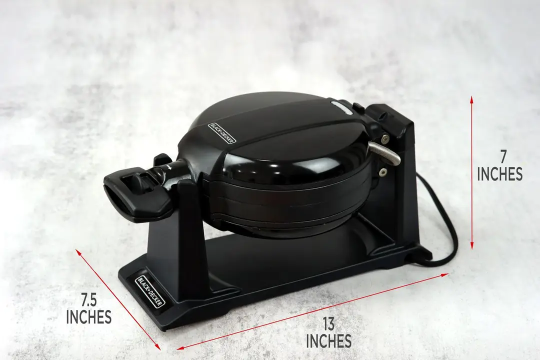 The Black and Decker WMD200B waffle maker with measurement markers to the side, showing the height as 7 inches, the length as 13 inches, and the width as 7.5 inches.