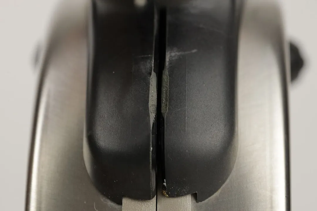 A close-up of the gashes on the black plastic detailing of the Presto Flipside Belgian waffle maker.