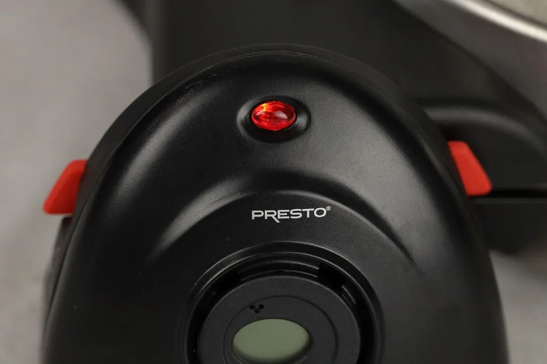 The red indicator light located on the base of the Presto Flipside Belgian waffle maker.