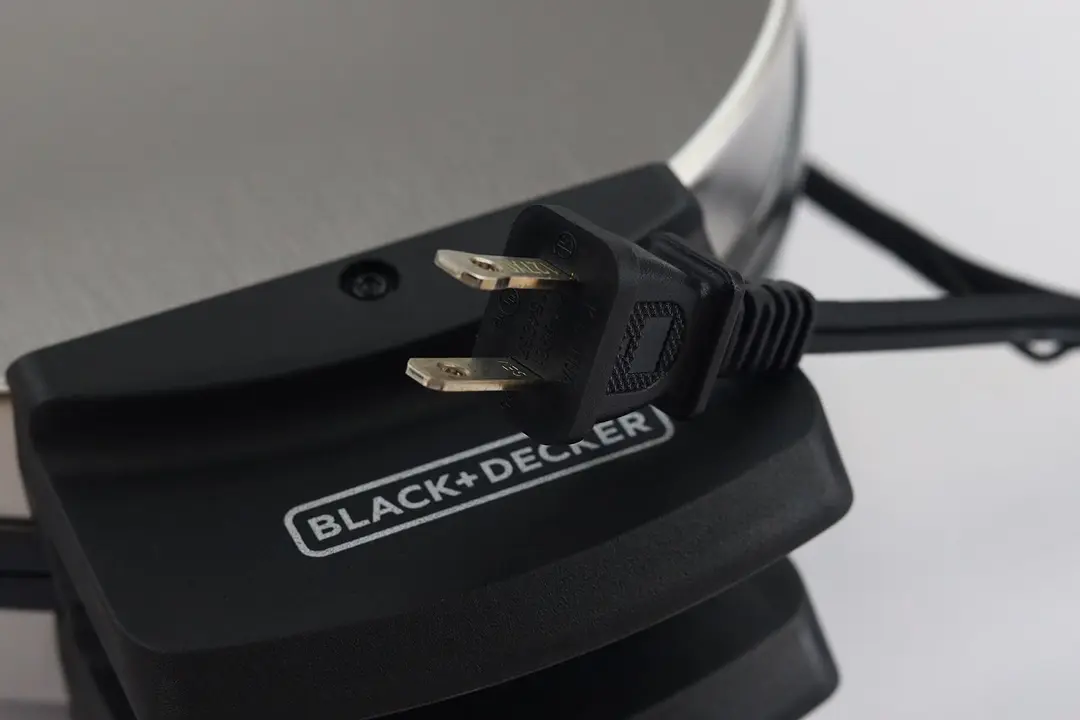 The power plug of the Black and Decker WMB500 Belgian waffle maker with the Type-A prongs design clearly visible.