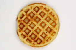 The light brown top crust of a waffle baked in 5 minutes using our self-mixed recipe.