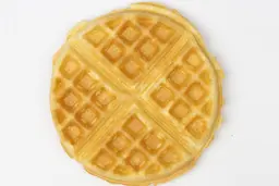 The golden brown top side of the waffle made by the Cuisinart WAF-F20P1 Double flip waffle maker in 5 minutes.