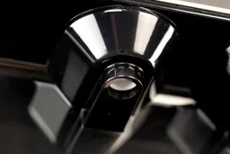 A close up image of a water cooler dispenser’s water nozzle revealing the ease of cleaning and sanitation.