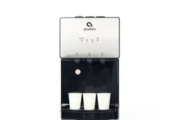 Three paper cups lined up on the drip tray of the Avalon A5 water cooler dispenser.