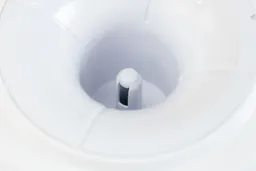 Close-up of a water needle of a top-loading water cooler dispenser.