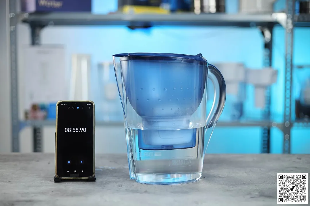 Brita Marella water filter pitcher next to smartphone timer