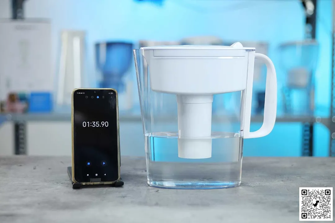 Brita Metro water filter pitcher next to smartphone timer