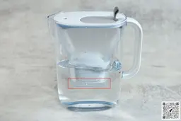 A full Brita Style jug and a marker marking the area below its filter