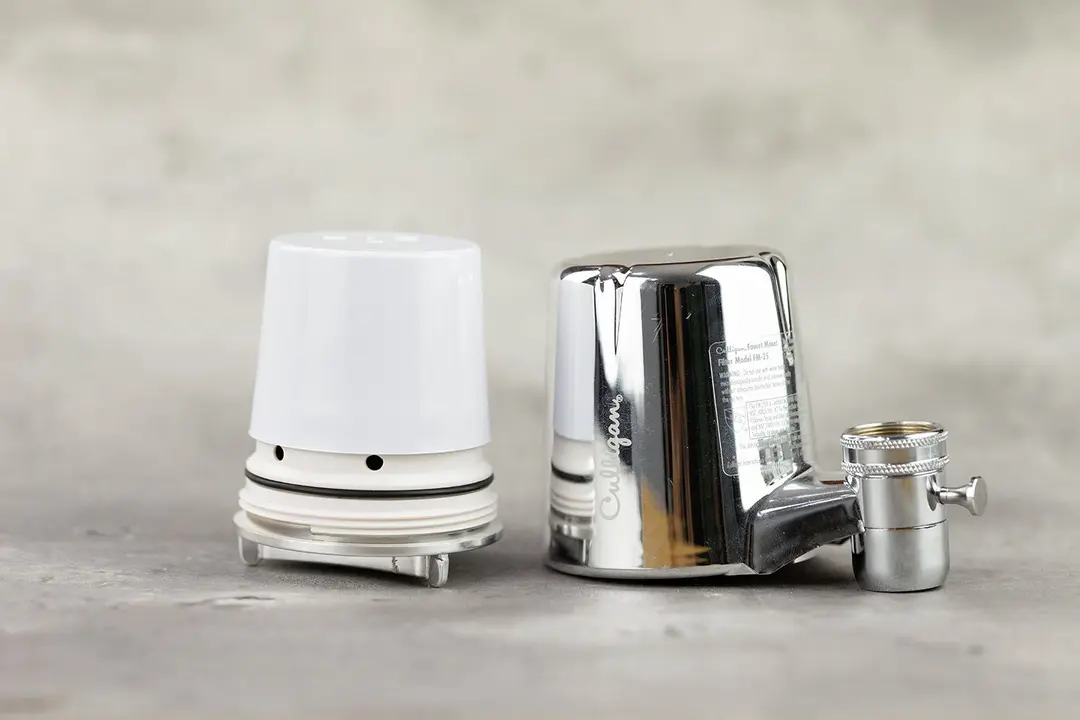 The Culligan FM-25 faucet-mount water filter next to the Culligan FM-25R filter piece.