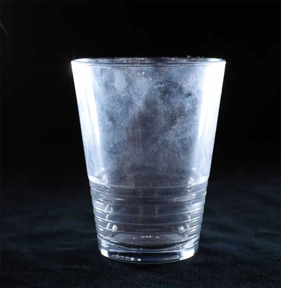 Cloudy calcium precipitation on a glass