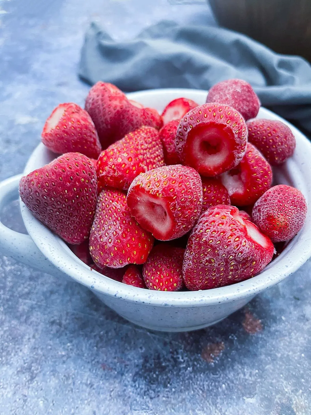 A bowl of hulled strawberries