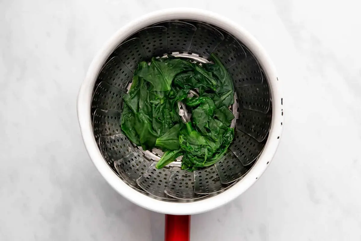 Your spinach should become tender after steaming