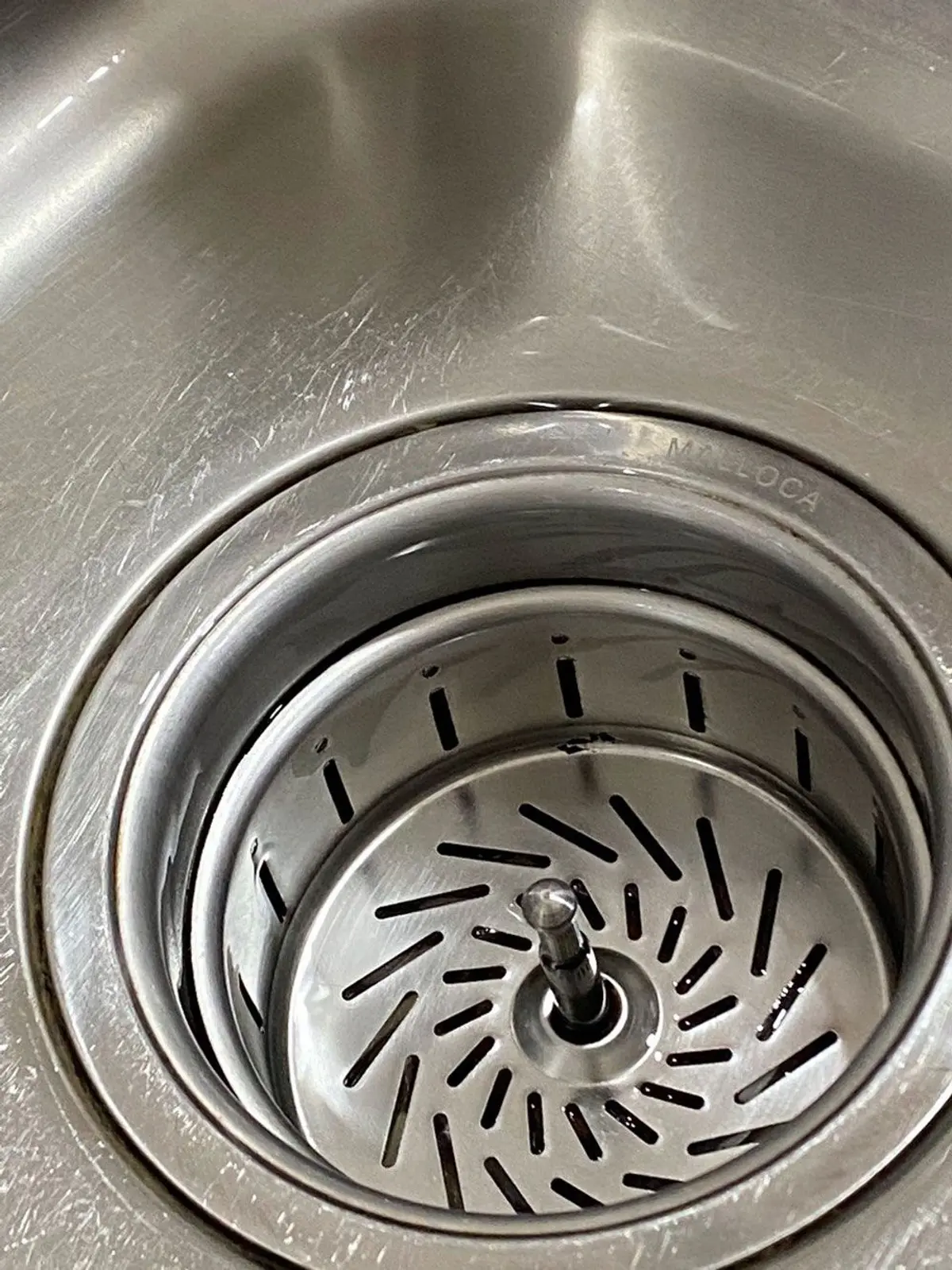 After Cleaning the Stainless Steel Sink with Baking Soda and Vinegar
